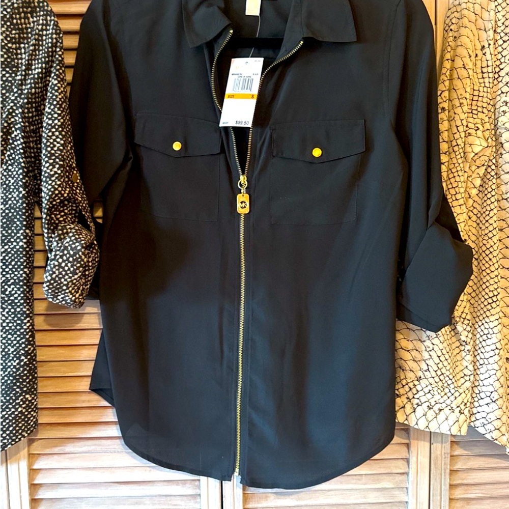 Michael Kors black full zip top with gold accents